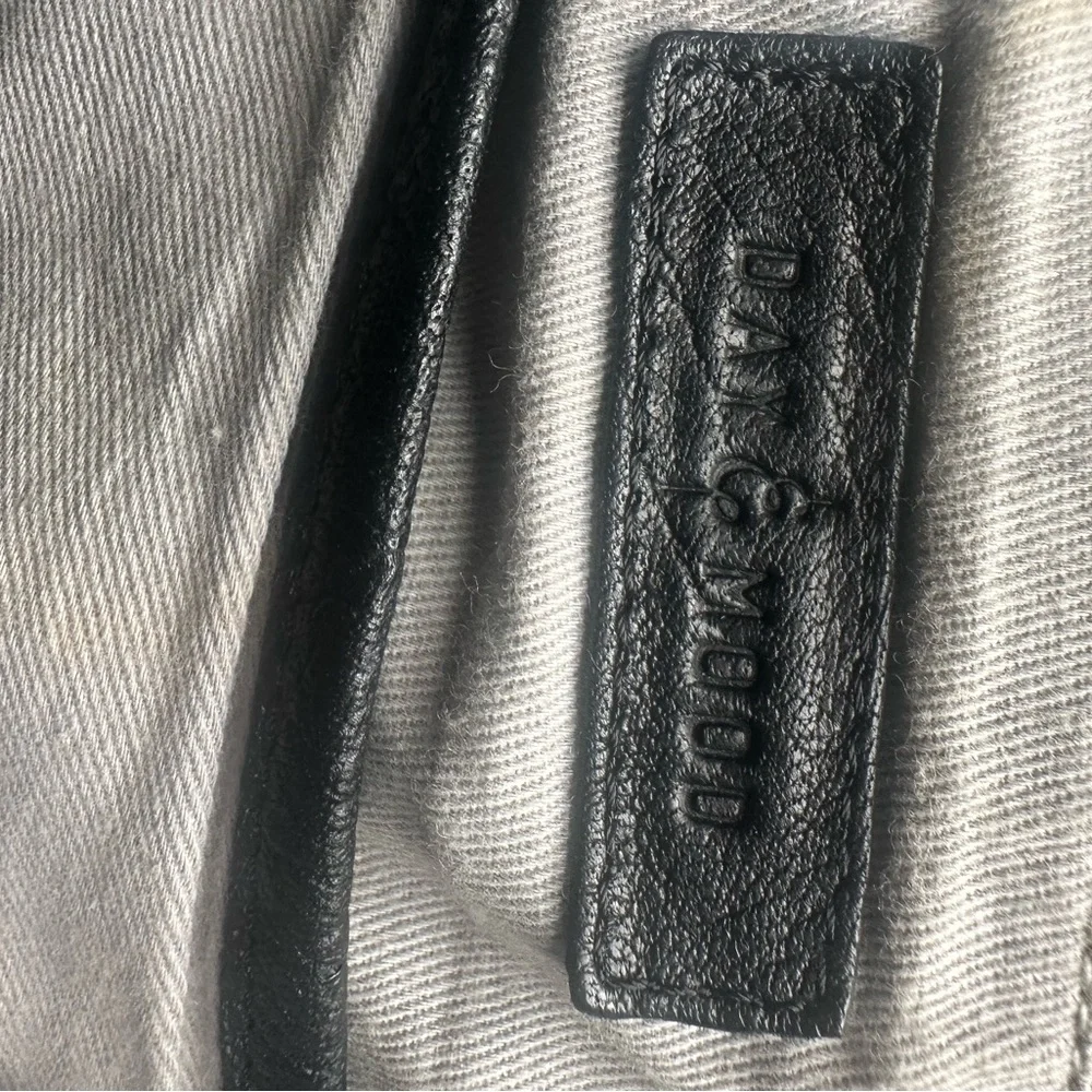 Black Women's Leather Backpack with Textured Flap